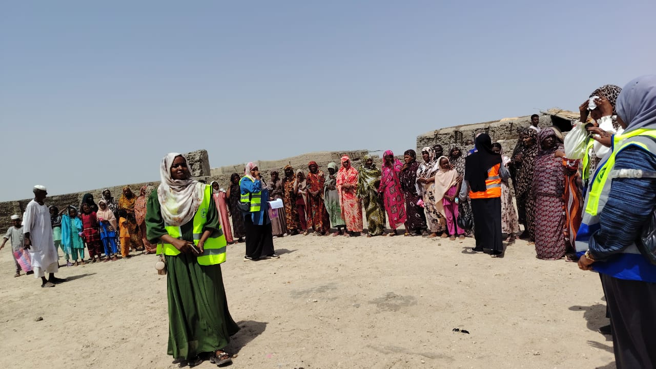 Families lining up for the Qurbani meat distribution in Sudan